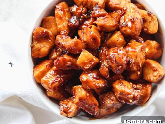 Sticky Sweet Heat Chicken Bites 4 Close-up of sticky sweet & spicy chicken bites in sauce