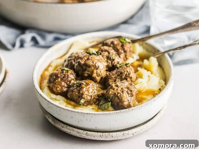 Comforting Meatballs Smothered in Rich Gravy 4 Finished breadcrumb-free meatballs in gravy, ready to serve.