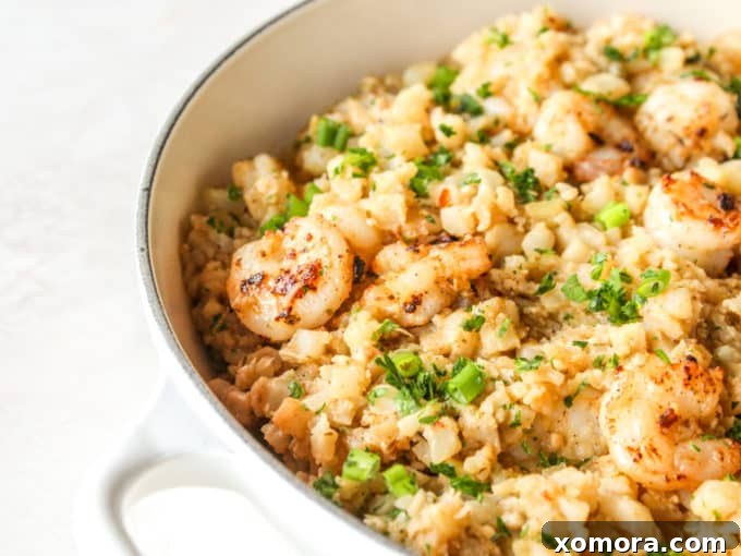 Zesty Cajun Shrimp and Cauliflower Rice Power Bowl 4 Raw cauliflower florets in a food processor, ready to be riced.