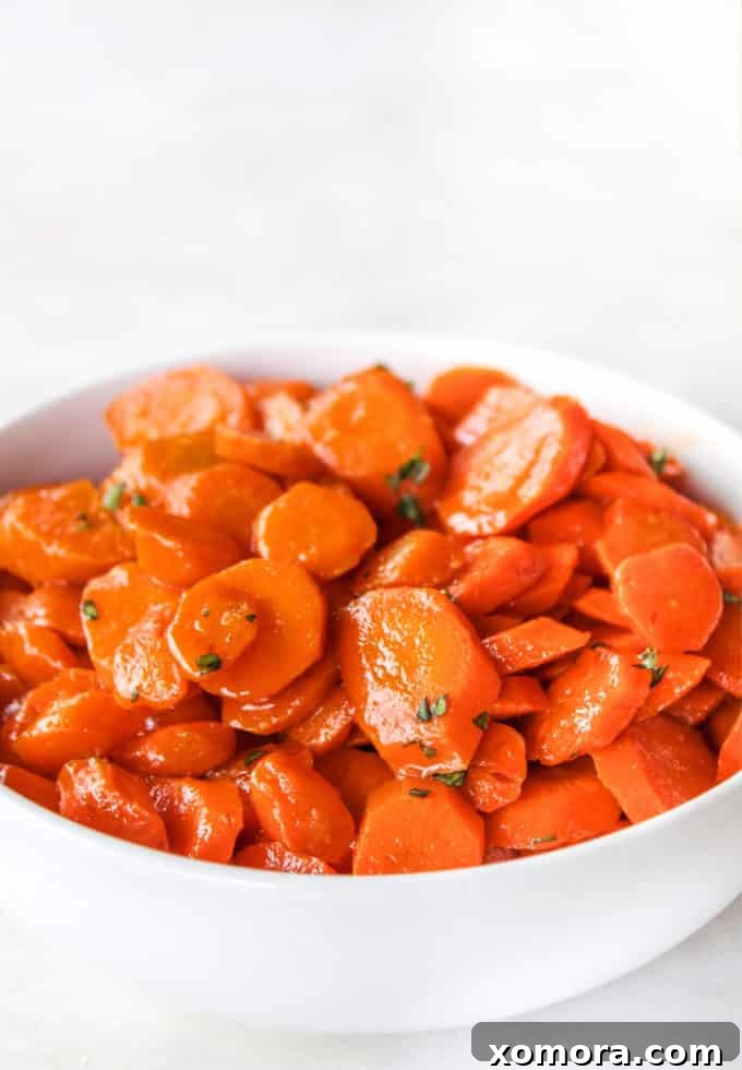 Caramelized Honey Carrots 2 A plate of perfectly glazed sautéed honey carrots, ready to be served as a delicious side dish.