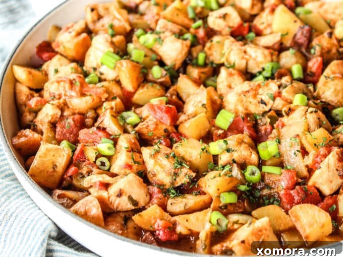 Southwestern Green Chile Chicken and Potato Skillet 3 Close-up of Green Chile Chicken and Potato Skillet in a pan