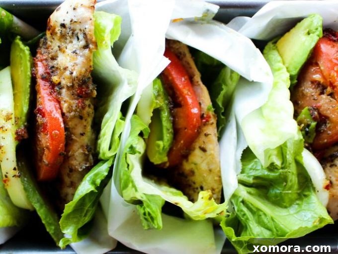 Wholesome Grilling Delights 11 Fresh Italian Marinated Chicken Lettuce Wraps, filled with grilled chicken and vibrant greens.
