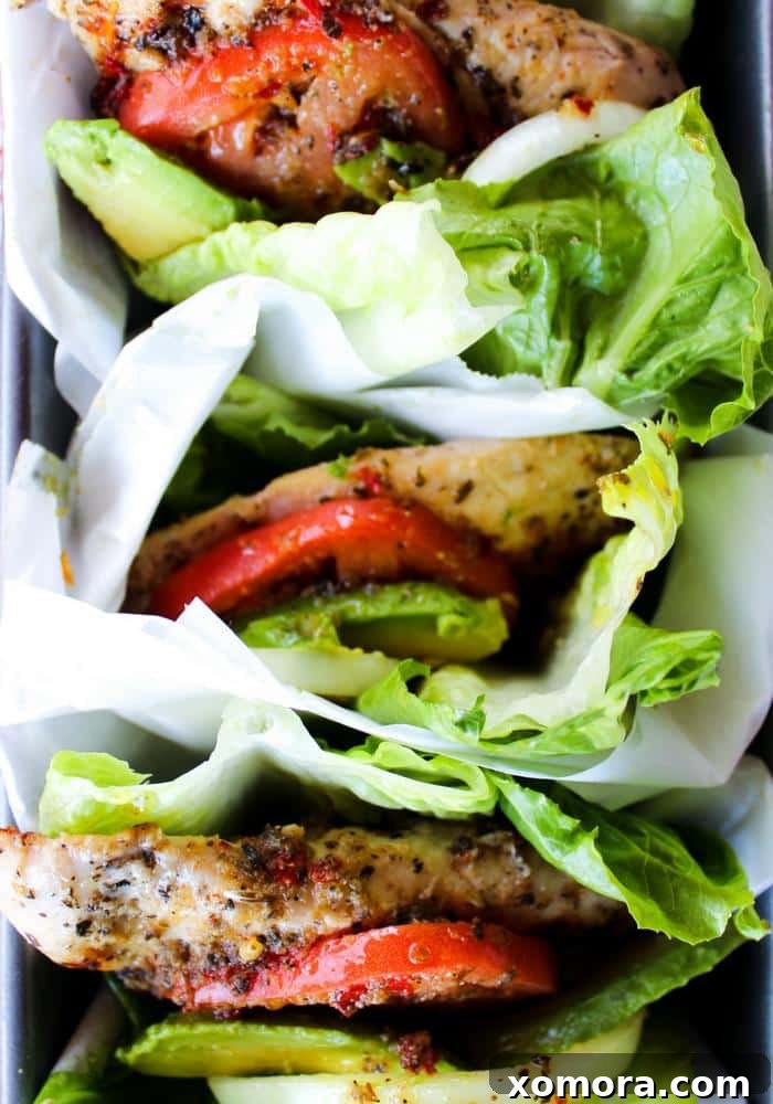 Wholesome Grilling Delights 12 Close-up of an Italian marinated chicken lettuce wrap, showing the chicken, herbs, and crisp lettuce.