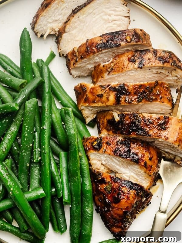 Wholesome Grilling Delights 14 Generously marinated and grilled chicken breast, perfectly golden and tender.