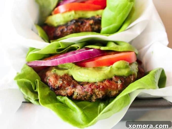 Wholesome Grilling Delights 19 Grilled Cilantro Turkey Burgers on toasted buns with fresh toppings.