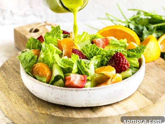 Flavorful & Guilt-Free Salad Dressings 13 A bowl of vibrant salad featuring Cilantro Citrus Vinaigrette.