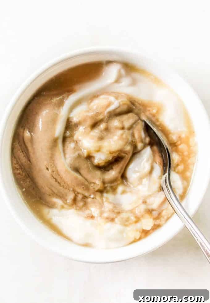 Effortless Mustard Delight 2 Easy and creamy Dijon mustard sauce drizzled over food, showcasing its smooth texture.