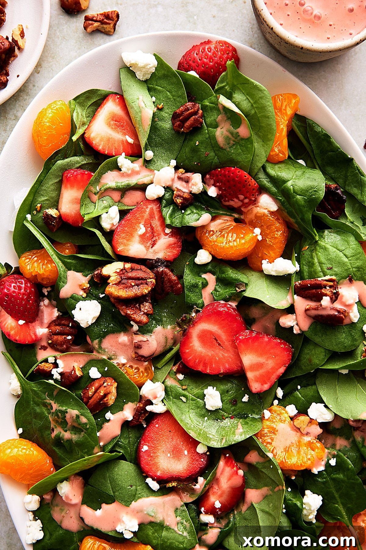 Gourmet Strawberry Goat Cheese Spinach Salad 2 Vibrant Strawberry Goat Cheese Spinach Salad with fresh strawberries and creamy dressing