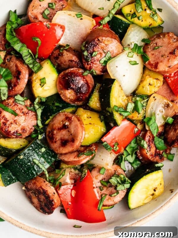 Reader-Approved Healthy Dinners 2 Close-up of skillet sausage and zucchini stir-fry.