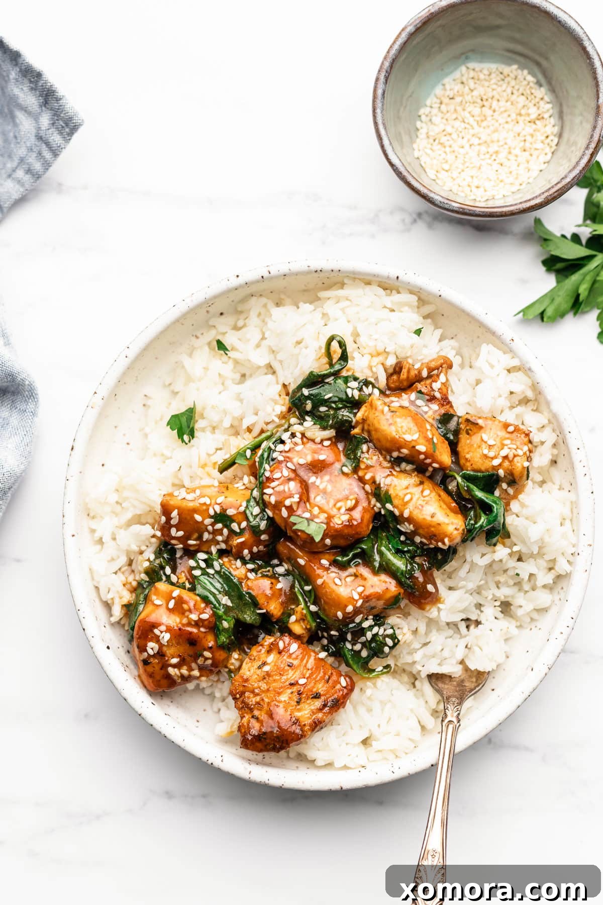 Close-up of creamy mustard chicken in a skillet, showcasing the rich sauce and tender chicken pieces.