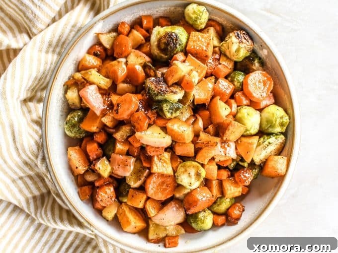 Golden Maple Glazed Roasted Vegetables 3 Fresh ingredients for Maple Roasted Veggies, including Brussels sprouts, carrots, apples, and sweet potatoes