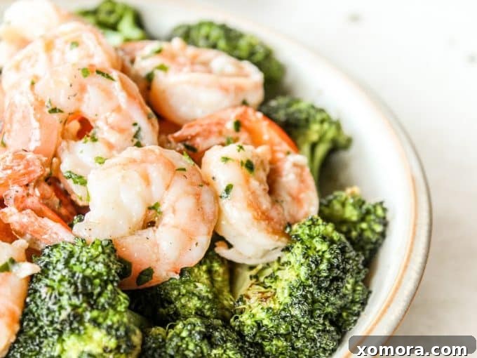 Zesty Lemon Butter Shrimp 5 Plated Lemon Butter Shrimp with fresh parsley