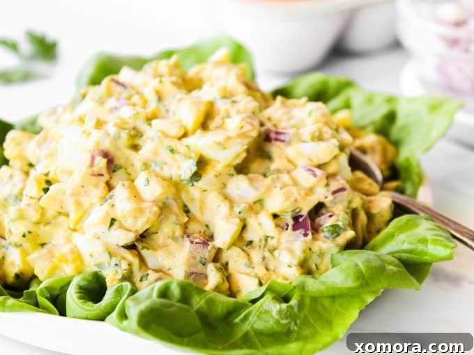 Aromatic Herb Egg Salad 4 Peeled hard-boiled eggs, some halved, ready for chopping