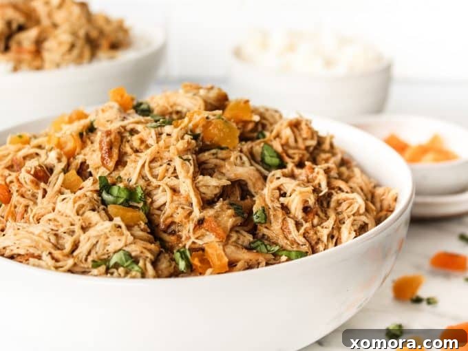 Instant Pot Apricot Glazed Chicken 3 Close-up of the flavorful apricot sauce coating the chicken in the Instant Pot.