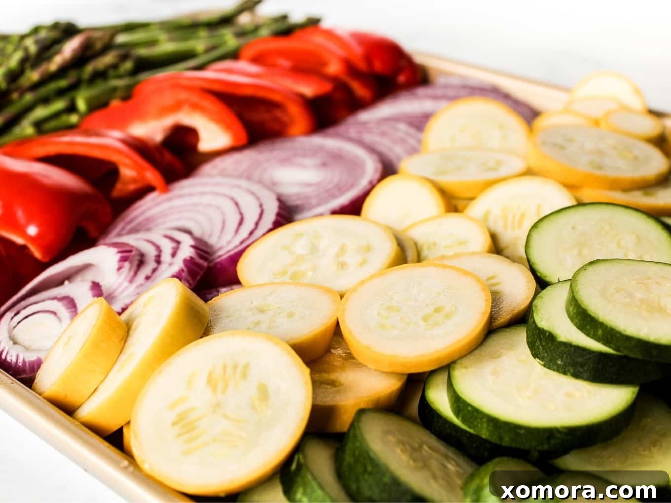 Smoky Grilled Harvest 3 Close-up of raw zucchini, squash, bell peppers, red onion, and asparagus, prepped and ready for grilling.