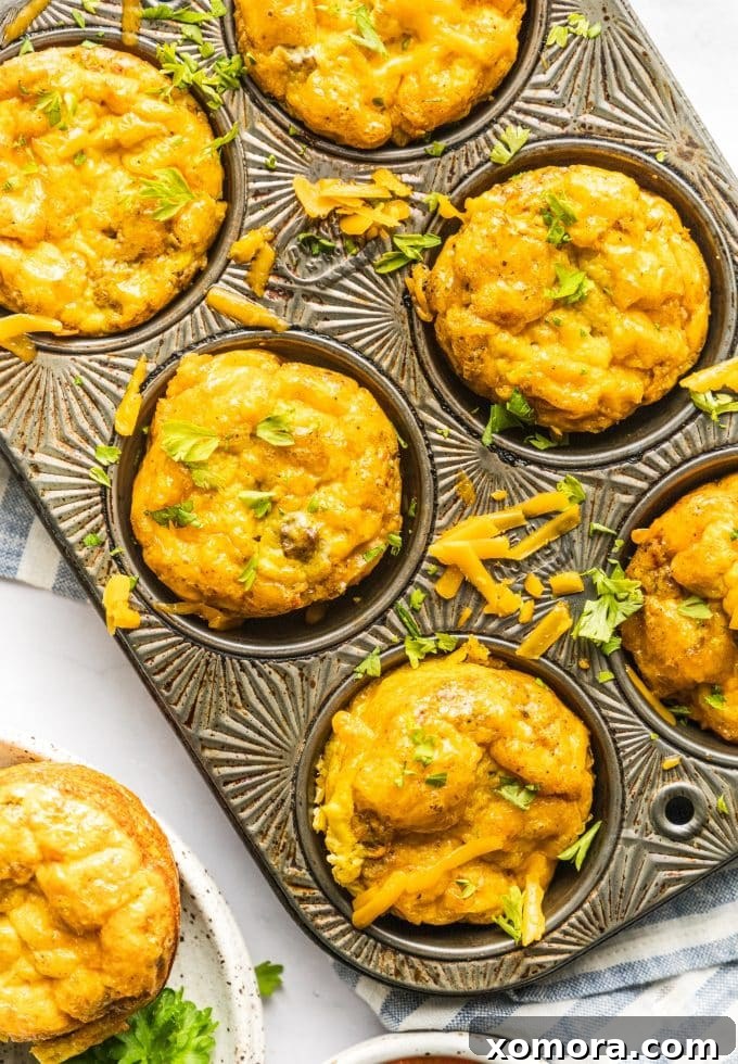 Savory Beef & Cheese Breakfast Muffins 5 A close-up of a Beef and Cheddar Egg Muffin, ready to be eaten.