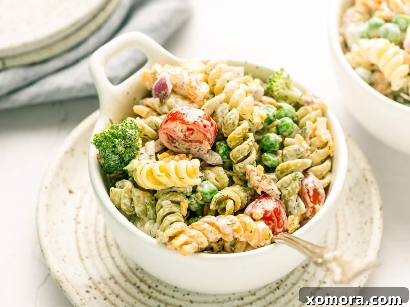 Ultimate Creamy Bacon Ranch Pasta 6 Small portion of Creamy Bacon Ranch Pasta Salad in a white bowl.