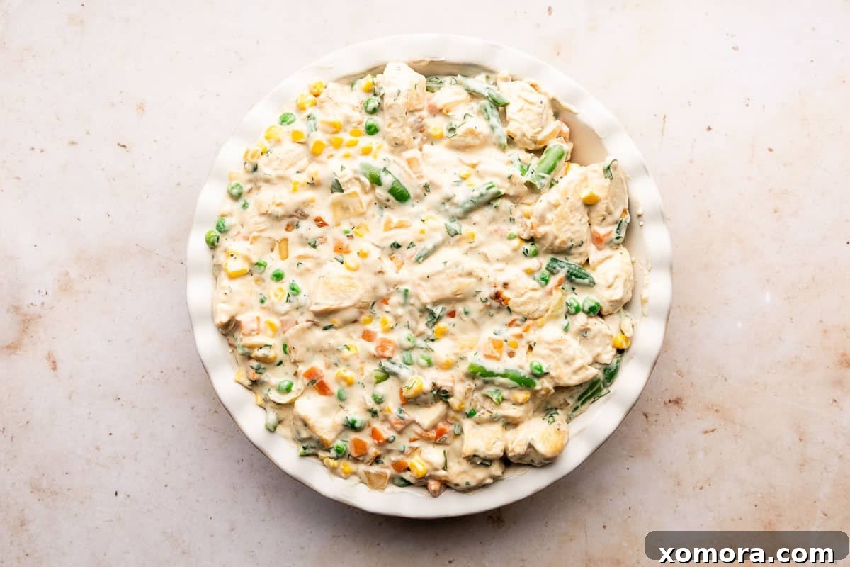 Effortless Homemade Chicken Pot Pie with Store-Bought Crust 5 Freshly baked homemade chicken pot pie, golden brown and bubbling.