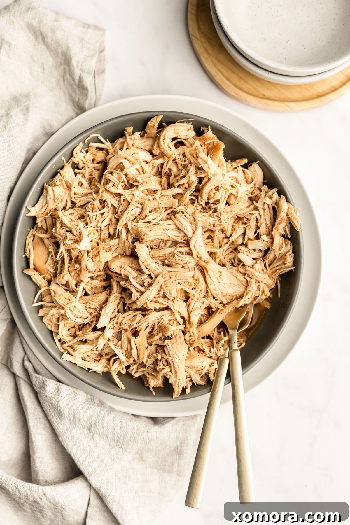 Effortless Slow Cooker Pulled Chicken 5 Slow cooker shredded chicken in a bowl