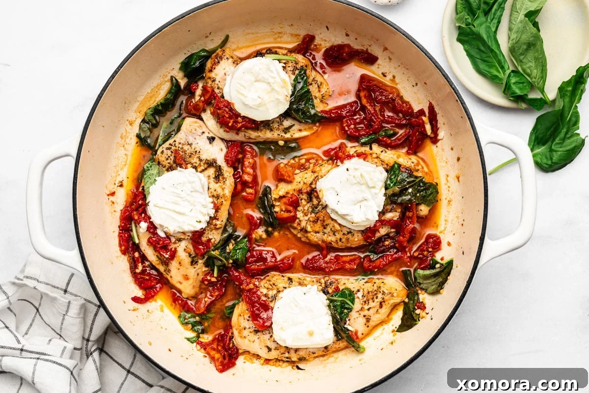 Mediterranean Chicken with Goat Cheese and Sun-Dried Tomatoes 5 Cooking Sun-Dried Tomato Goat Cheese Chicken in a skillet
