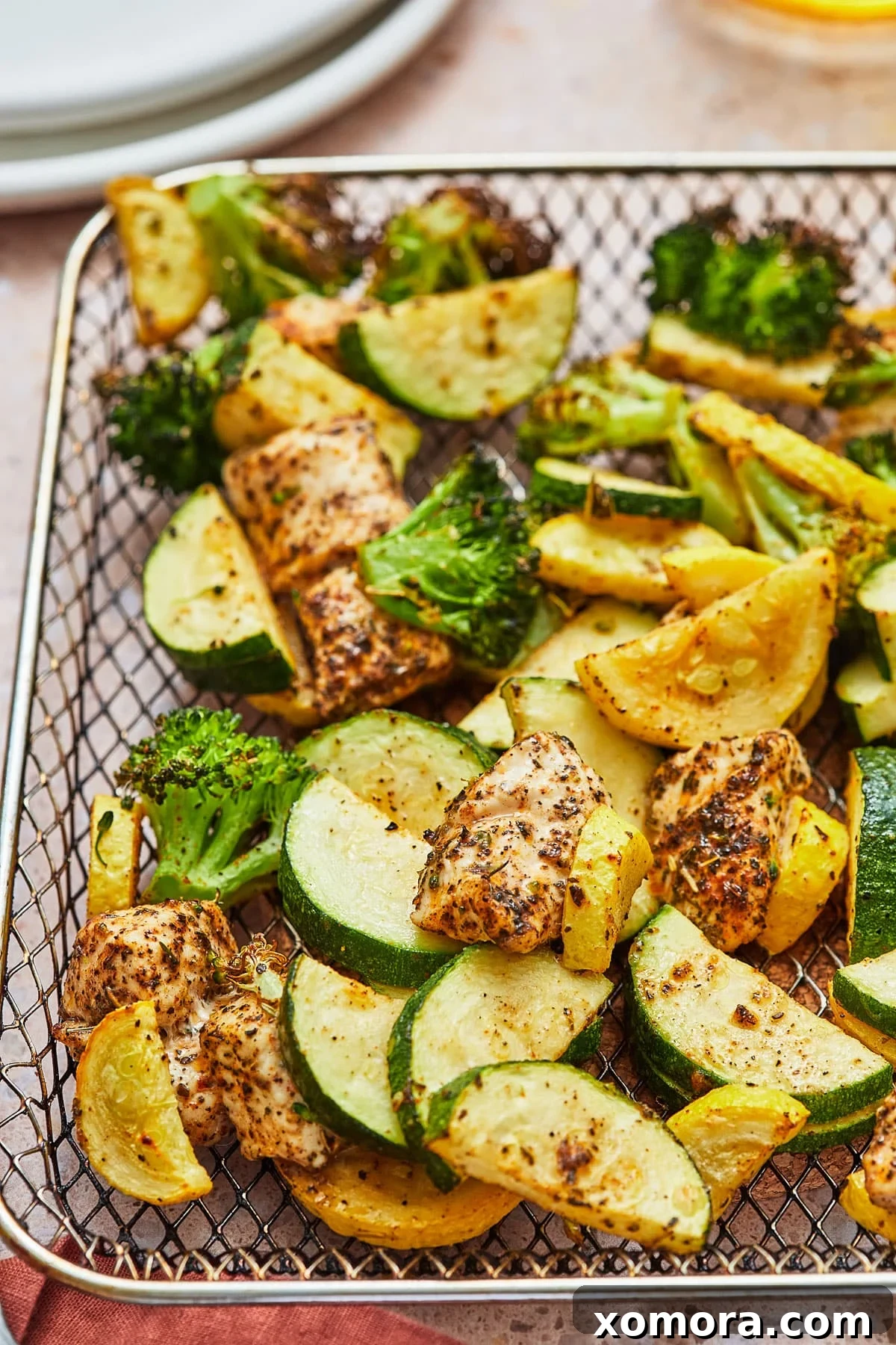 Crispy Air Fryer Chicken and Colorful Vegetables Plated