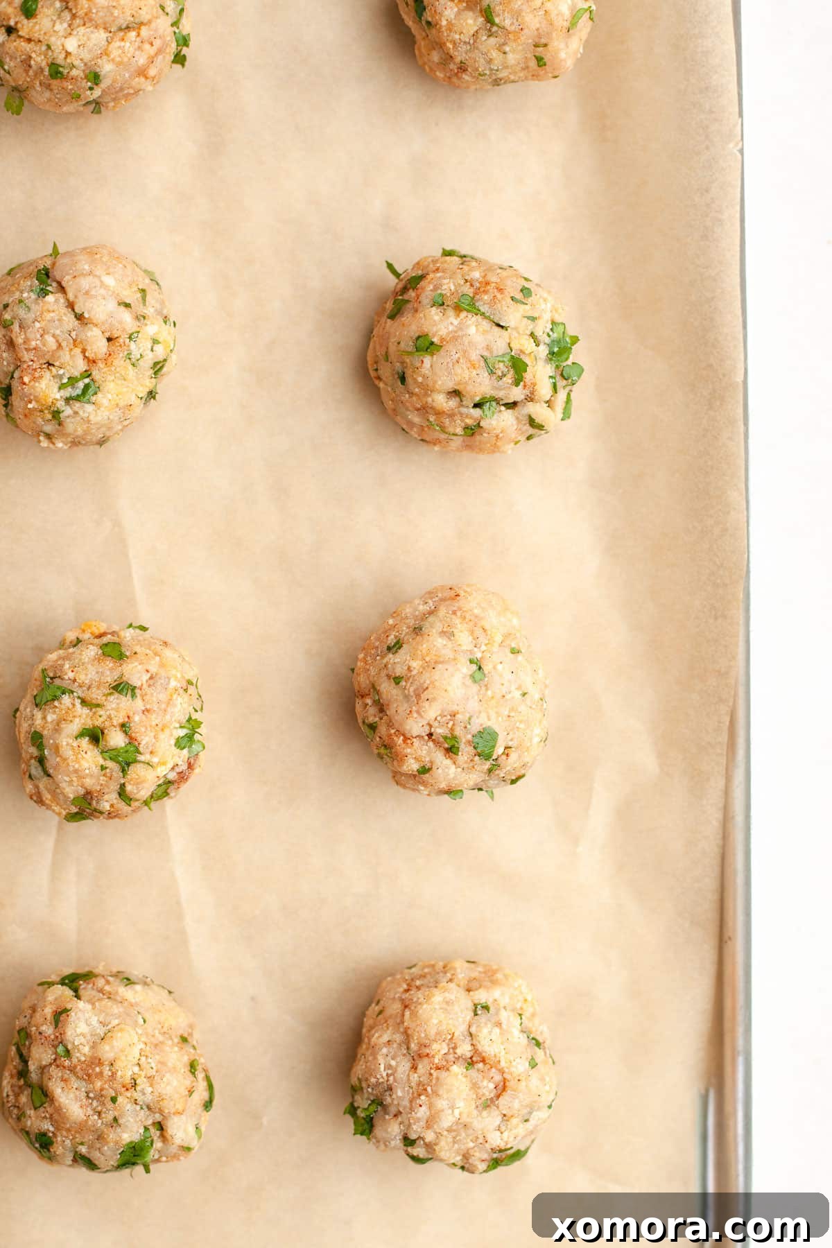 Savory Baked Parmesan Chicken Meatballs 5 Serving of baked parmesan chicken meatballs with marinara sauce