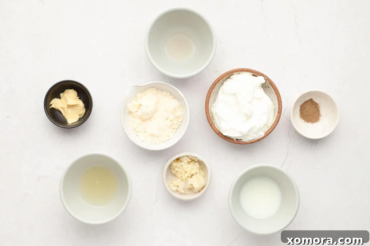 Quick Healthy Caesar Dressing Anchovy-Free 3 Ingredients for healthy Caesar salad dressing laid out on a kitchen counter.