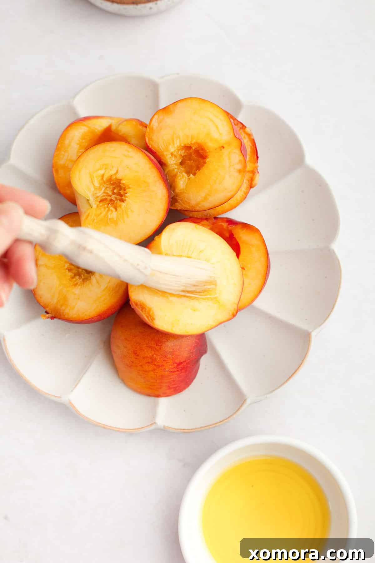 Caramelized Grilled Peaches with Creamy Vanilla 3 Close-up of ripe peaches ready for grilling