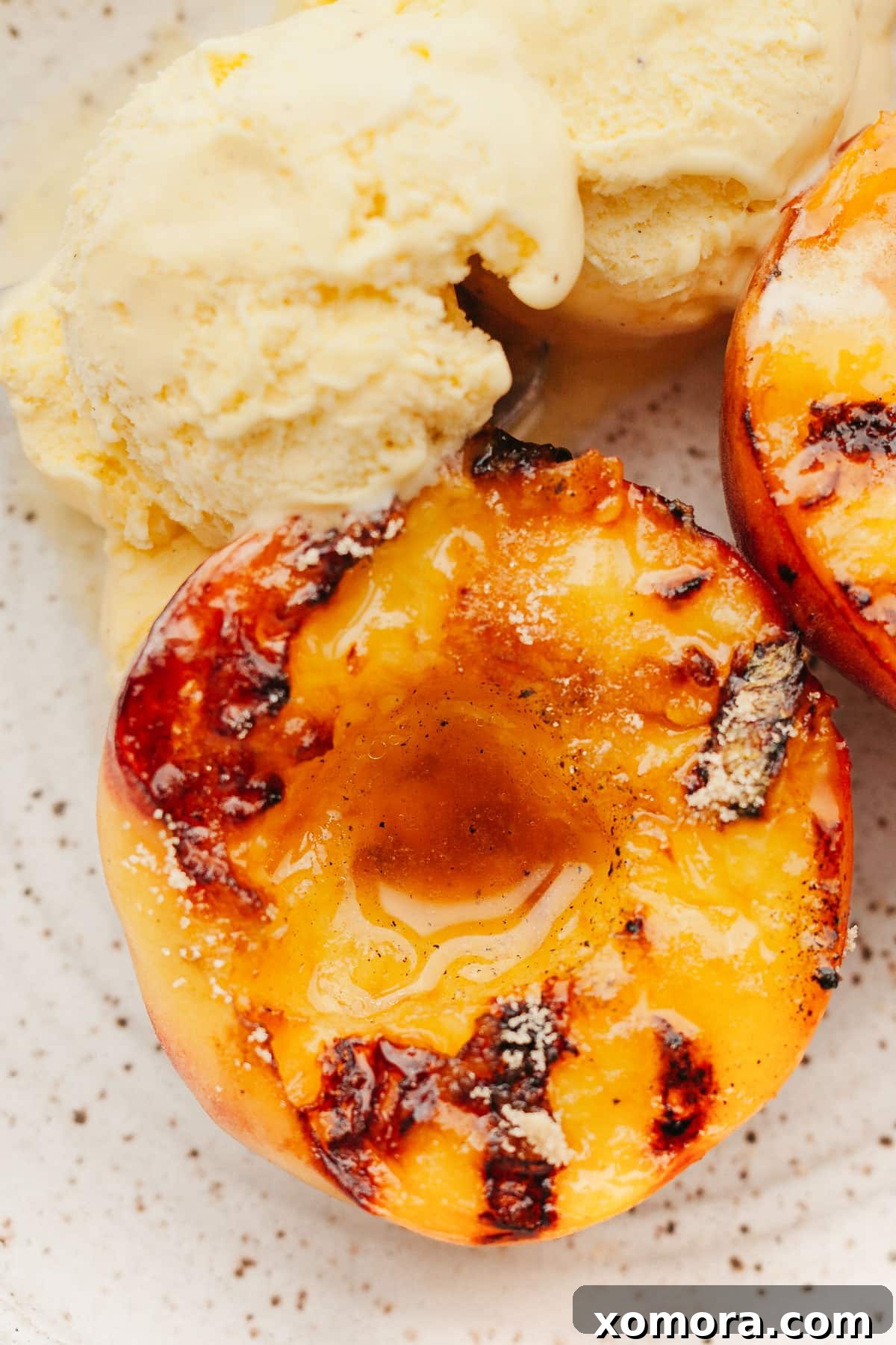 Caramelized Grilled Peaches with Creamy Vanilla 5 Grilled peaches served with oats and other savory dishes for versatile uses