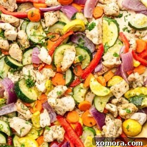 Appetizing Sheet Pan Chicken and Rainbow Vegetables dish.
