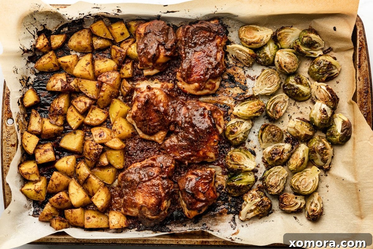 Sweet Mustard Sheet Pan Chicken with roasted potatoes and Brussels sprouts.