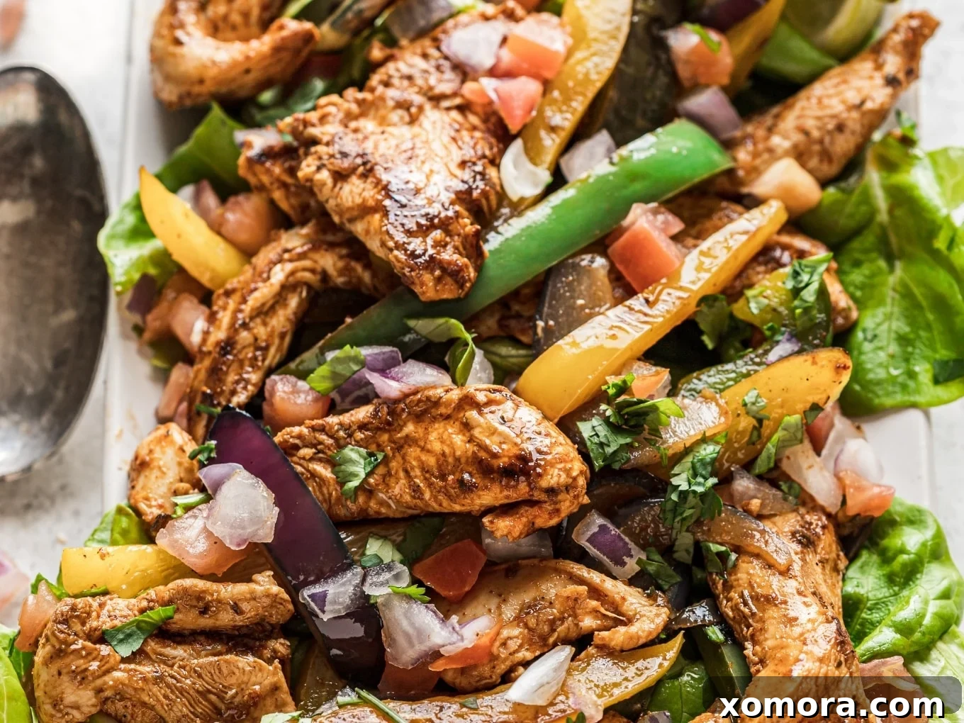 Skillet Chicken Fajitas, sizzling with peppers and onions.