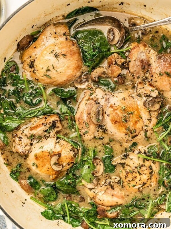 Creamy Herb Mushroom Chicken, served in a skillet.