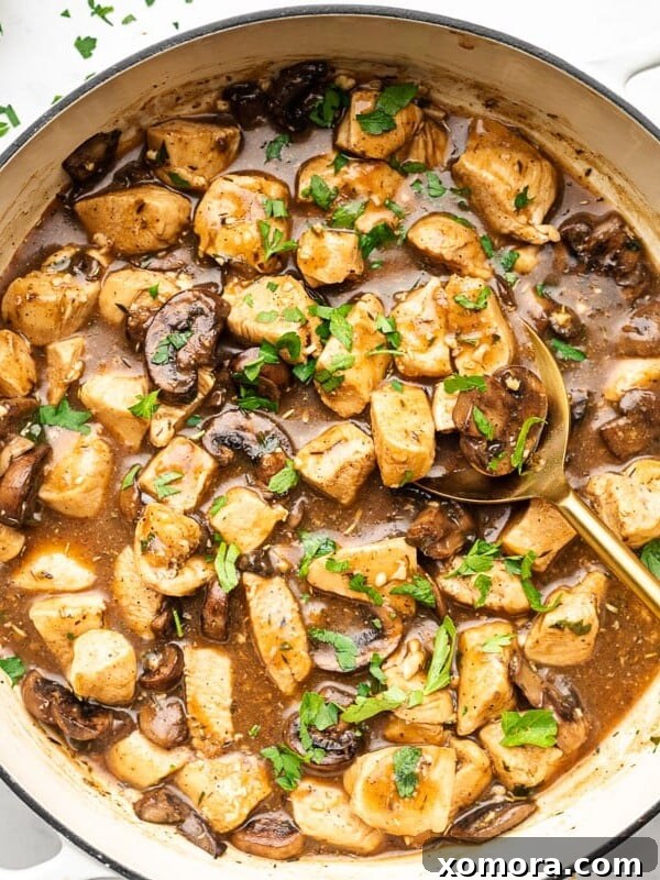 Chicken in Mushroom Gravy, served with mashed potatoes.