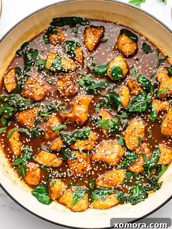 Creamy Mustard Chicken, served in a skillet.