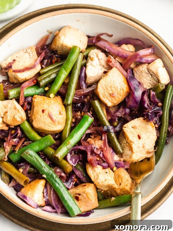 Easy Chicken Green Bean Stir Fry, loaded with chicken and vegetables.