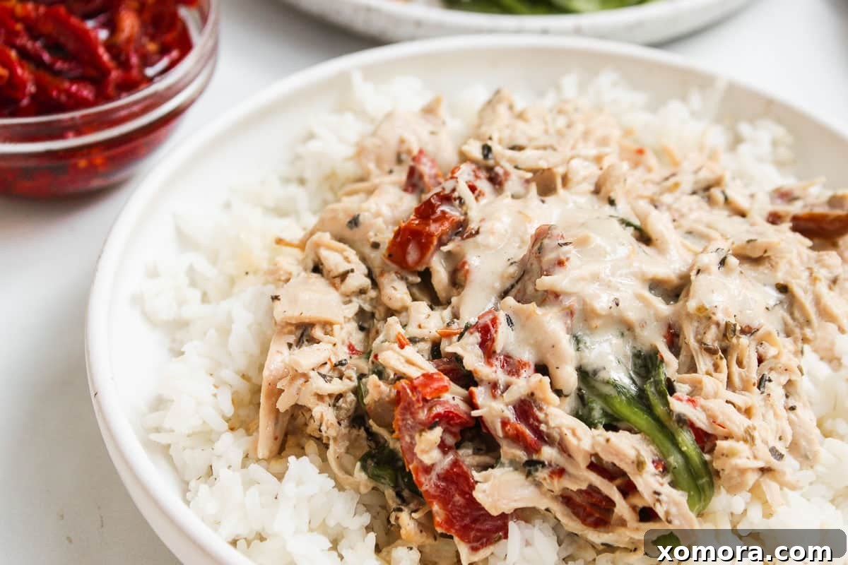 Slow Cooker Creamy Sun-Dried Tomato Chicken, rich and decadent.