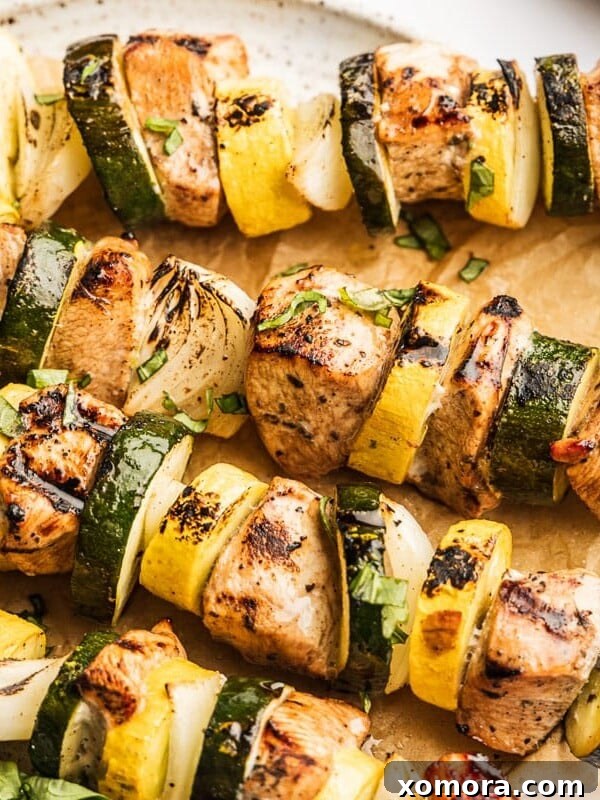 Grilled Garlic Balsamic Chicken Kabobs with zucchini, squash, and onion.
