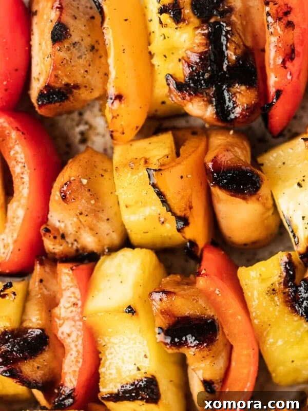 Chicken and Pineapple Kabobs, sweet and savory on skewers.