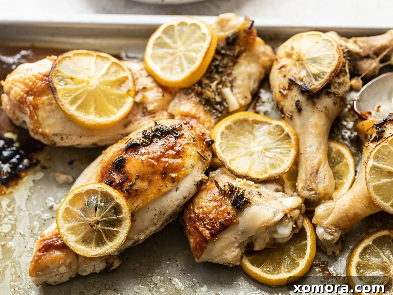 Lemon Herb Roasted Chicken, beautifully browned with herbs.