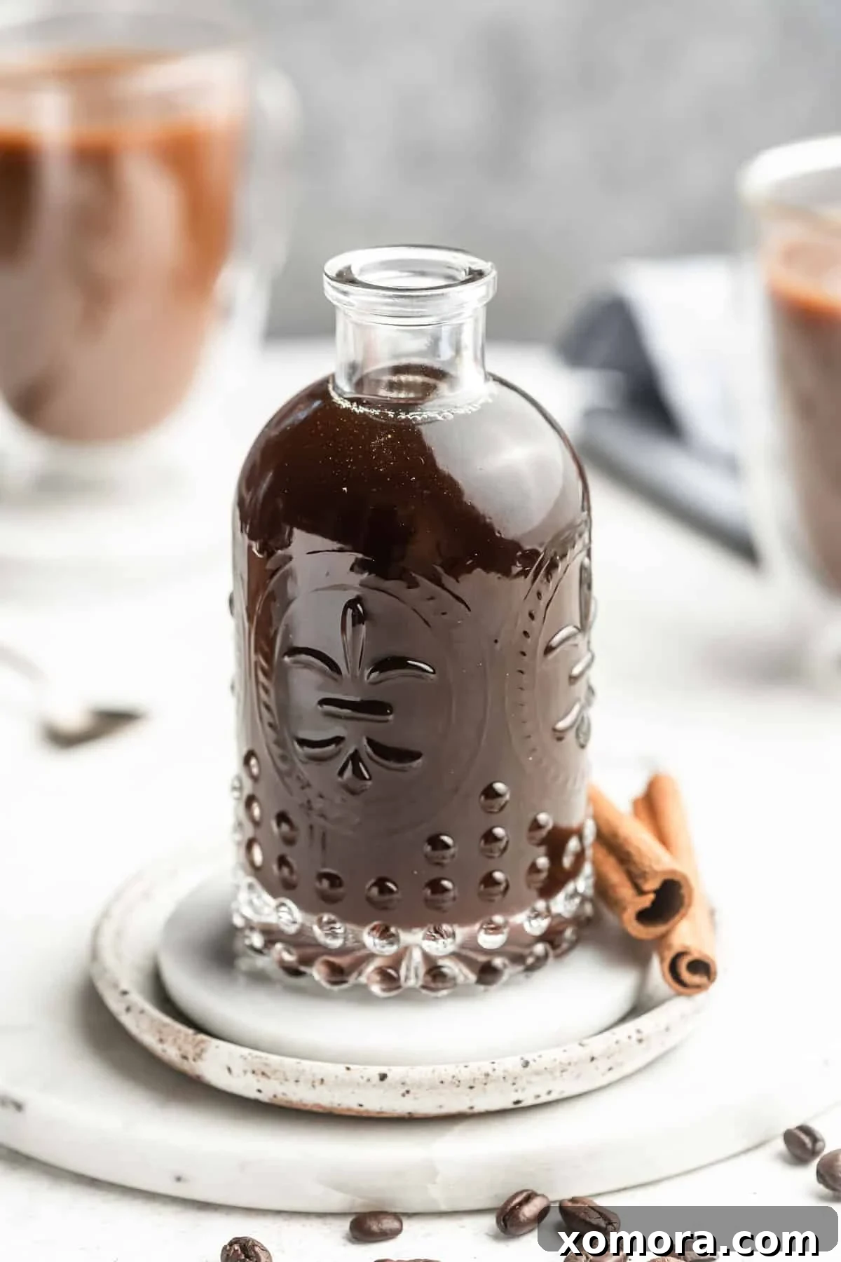 Crafting Brown Sugar Simple Syrup 2 Brown sugar simple syrup drizzled into a glass of iced coffee.
