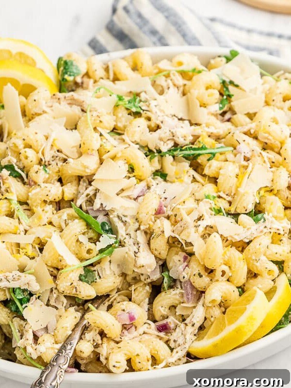 Lemon Pasta Salad with shredded chicken and arugula.