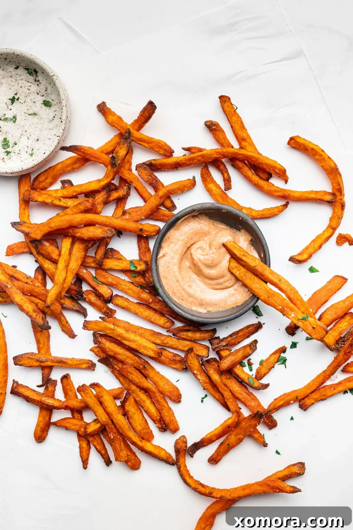 Perfect Air Fryer Sweet Potato Fries 6 Air Fryer Sweet Potato Fries in a bowl with dipping sauce