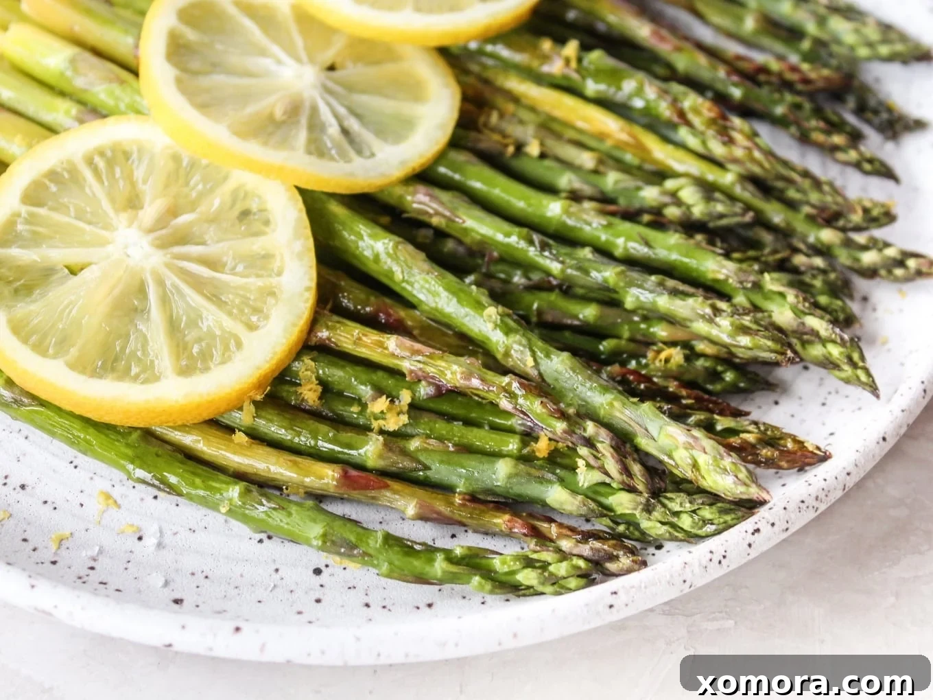 Roasted Lemon Asparagus, brightened with lemon slices.