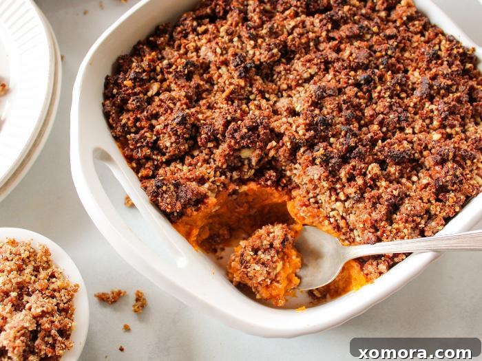 Sweet Potato Casserole with Pecan Crumble, a creamy and crunchy delight.
