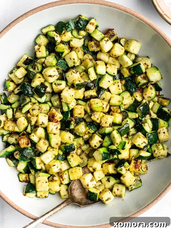 Air Fryer Zucchini, golden and tender-crisp.