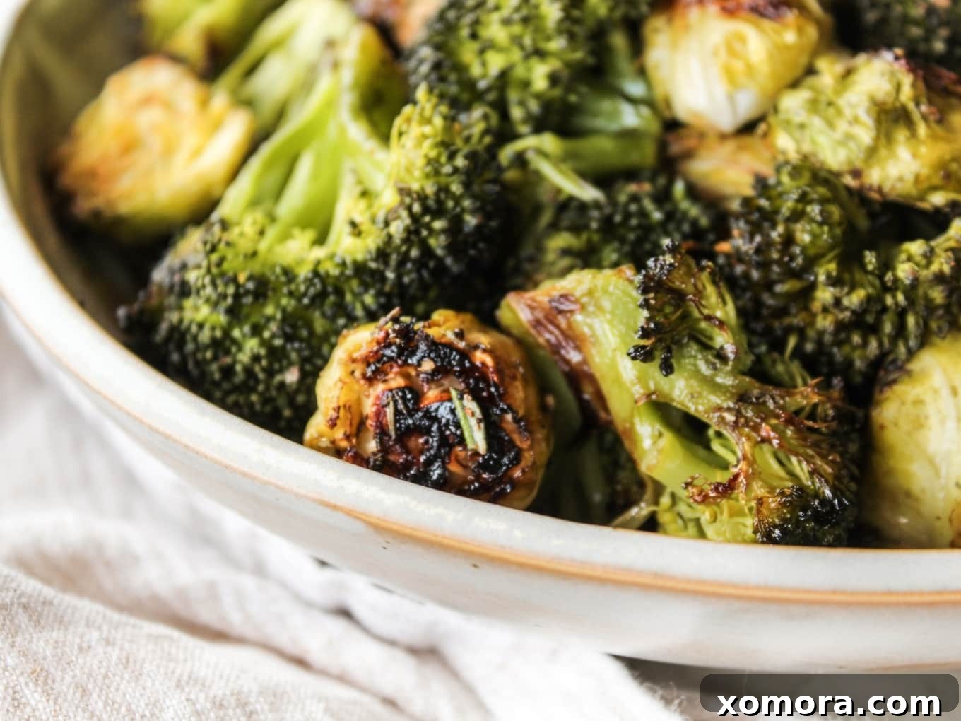 Herb Roasted Brussels Sprouts and Broccoli, on a sheet pan.