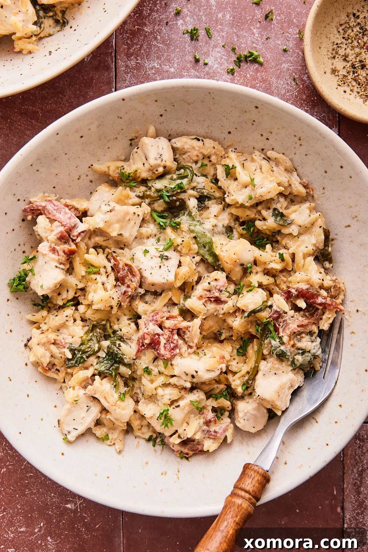 Dreamy Chicken Orzo Casserole 7 Another angle of the creamy chicken orzo bake, ready for serving.