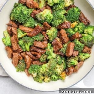 Tender Beef Crisp Broccoli 4 Classic beef and broccoli stir-fry in a bowl, ready to serve.