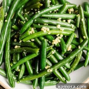 A delicious bowl of Sautéed Garlic Green Beans.